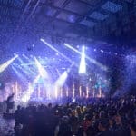 Jabu Events corporate MICE event in Bangkok with LED stage lighting and audience in luxury hotel ballroom